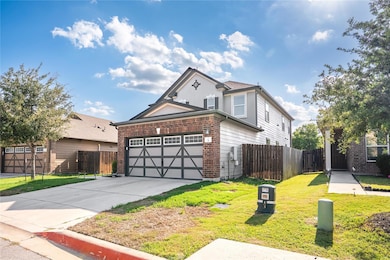 Traditional home featuring concrete driveway, an 