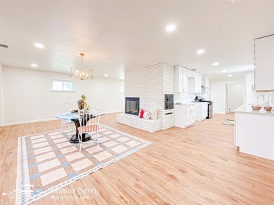 Living room featuring recessed lighting, light woo