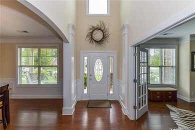 Beautiful two-story entry with tons of natural lig