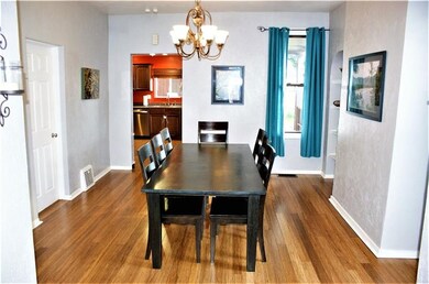 The dining room feels open and bright while adjoin