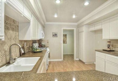 Exquisite kitchen with granite counters and lots o