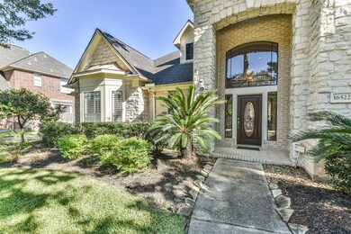 A beautiful 2 story entry speaks to high end architectural appointments