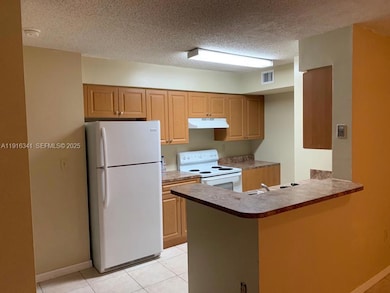 Kendall Lakes Towers unit 404, Miami, FL 33193 - photo 2