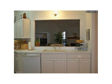 All White Kitchen open to the Great Room and Dinin
