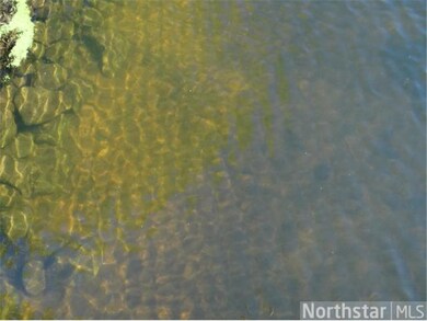5.5 feet water clarity. Nice Sandy bottom.