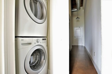 Laundry Unit In Hallway