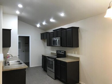 Kitchen - door to laundry