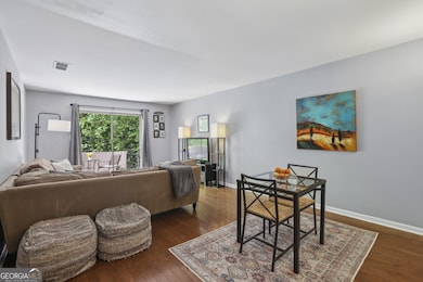 Welcome to this beautifully maintained Top-Floor Condo located in the heart of Sandy Springs!