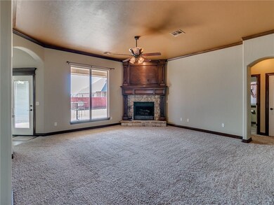 Large living with wood burning fireplace that has 