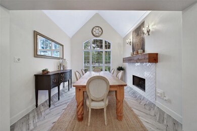 Appealing wood look tile floors flow throughout th