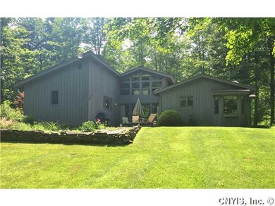 Exterior Back. Flagstone Patio leads to the backya
