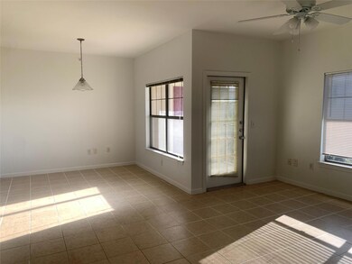 Tiled spare room featuring healthy amount of natu