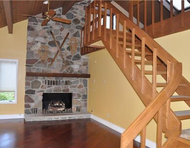 Family Room. 2 story stone fireplace, overlooked b