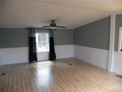 spacious living area, vaulted ceiling