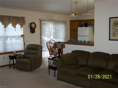 View from great room into kitchen with sliding doo