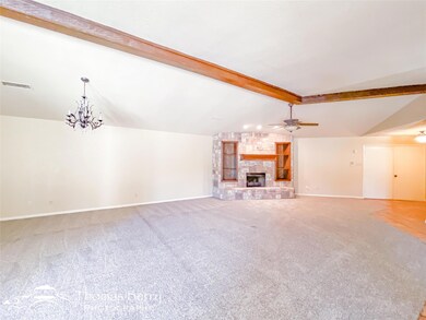 large living area with a beautiful Fireplace