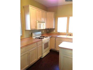 All appliances remain in the kitchen complete with