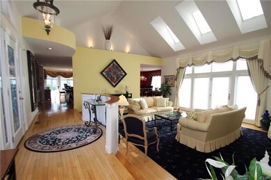 Impressive entryway... Hardwood Flooring, 3 Skylig