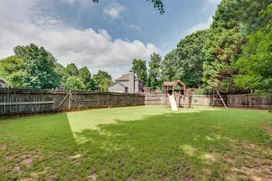 Enjoy the huge flat private fenced-in backyard.  Can you see yourself playing cornhole or yard games back there?