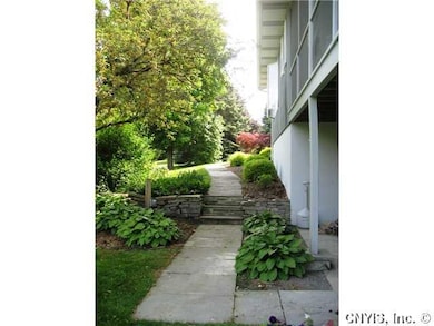 Backyard. Patio and walkway area outside of lower 