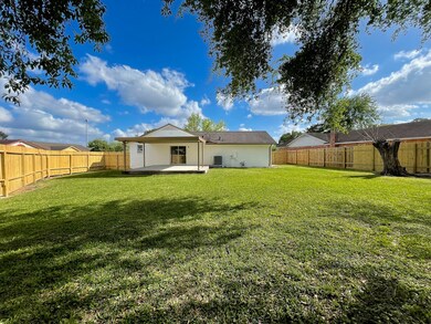 13102 Winding Wood Dr, Houston, TX 77038 - photo 6