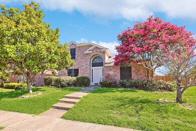 View of front facade with a front lawn