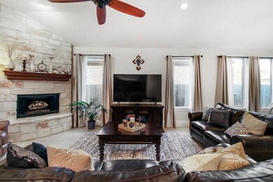 Don't miss the floor to ceiling Fireplace with Custom Wood Mantle.