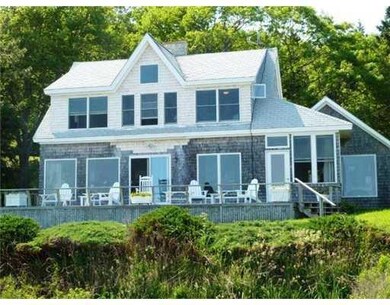 Exterior Back. Waterside of home...