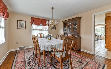 Generous sized dining room with original hardwood