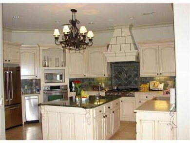 Kitchen. Enormous designer kitchen has beautiful c