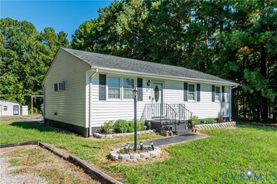 View of front facade featuring crawl space, a front lawn, and a shingled roof