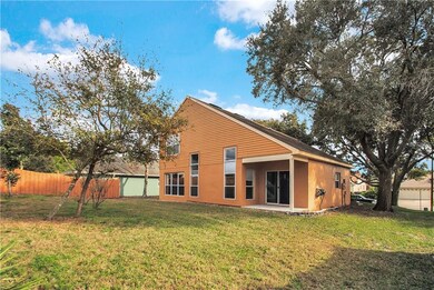 Back of home. Showing the covered patio, perfect f