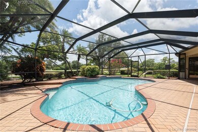 Screened & tiled lanai,
sparkling freeform pool!