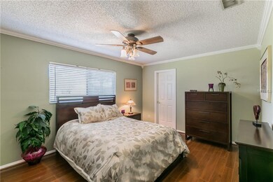 large master suite with walk in closet