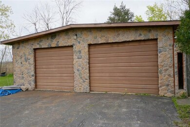 This garage can hold 4 or more cars great for  Mec