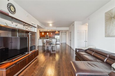 Living room featuring dark hardwood / wood-style flooring