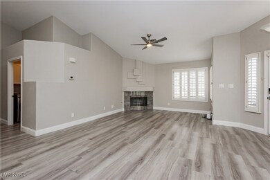 Unfurnished living room with a wealth of natural l