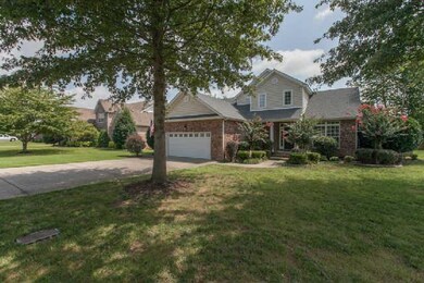 Front yard has 3 large mature trees to add shade and pretty landscaping.