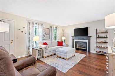 Living room featuring engineered hardwood flooring