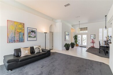 Formal living room with open Foyer.