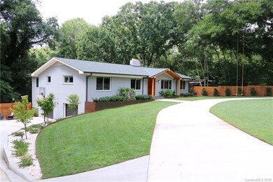 Two-car side load garage, beautiful landscaping, a