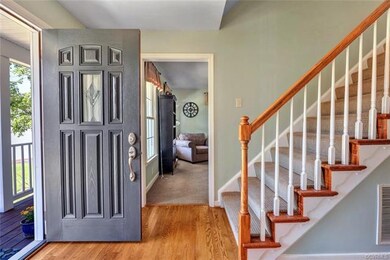 Even the front door with adjacent transom lights has just been painted! Beautiful entryway.