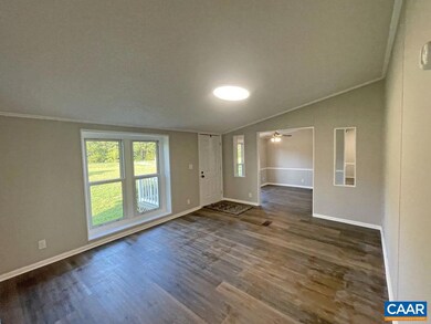 ... with Front Door Entry, Wide Opening to Formal 