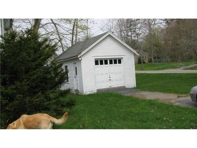Parking Lot/Garage. From front yard...