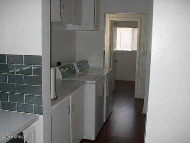 Laundry next to kitchen