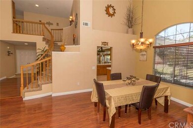 DINING ROOM WITH VIEW INTO KITCHEN