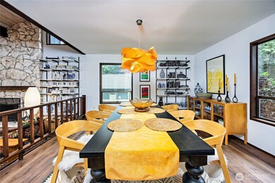 Stunniing lighting and ample space to entertain in this dining area.