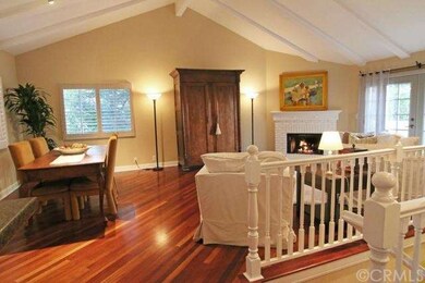 High wood beam ceilings make the 