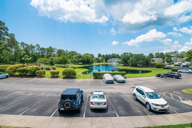 Uncovered parking lot with a water view