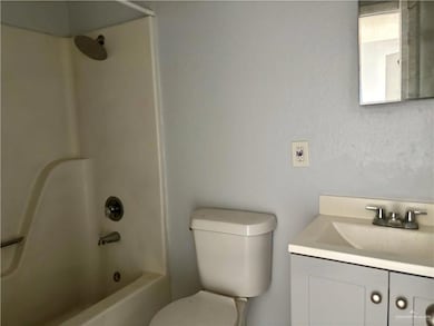 Bathroom featuring vanity and shower / bath combination